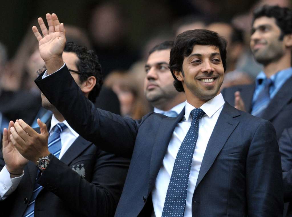(FILES) Manchester city owner Sheikh Mansour bin Zayed Al Nahyan (C) looks on during the English Premier League football match against Liverpool at The City of Manchester stadium, Manchester, north-west England on August 23, 2010.