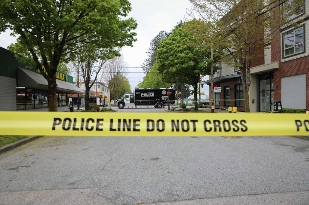 VANCOUVER (Canada), 27/04/2025.- Police tape closes off the area where a car-ramming tragedy took place during a Filipino festival in Vancouver, British Columbia, Canada, 27 April 2025. At least 11 people are dead after a man drove his car into a crowd of pedestrians at a Filipino festival on 26 April. EFE/EPA/JUSTINE BEAULIEU-POUDRIER