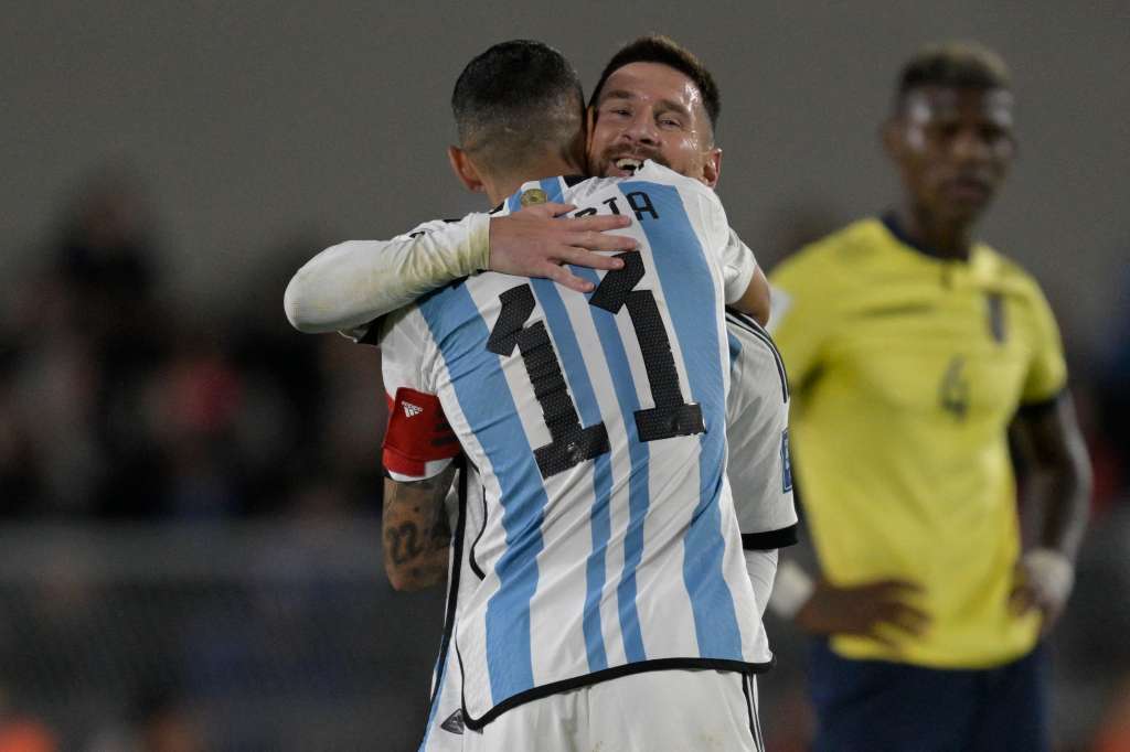 (FILES) Argentina's forward Lionel Messi (R) gives the captain's armband to teammate Angel Di Maria as he is substituted during the 2026 FIFA World Cup South American qualifiers football match between Argentina and Ecuador, at the Mas Monumental stadium in Buenos Aires, on September 7, 2023.
