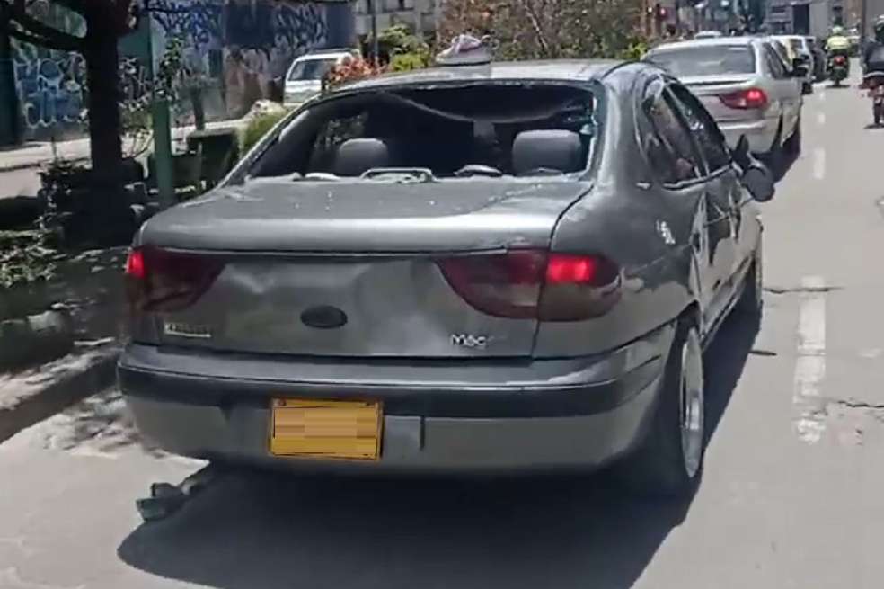 carro vidrio roto calle de bogotá
