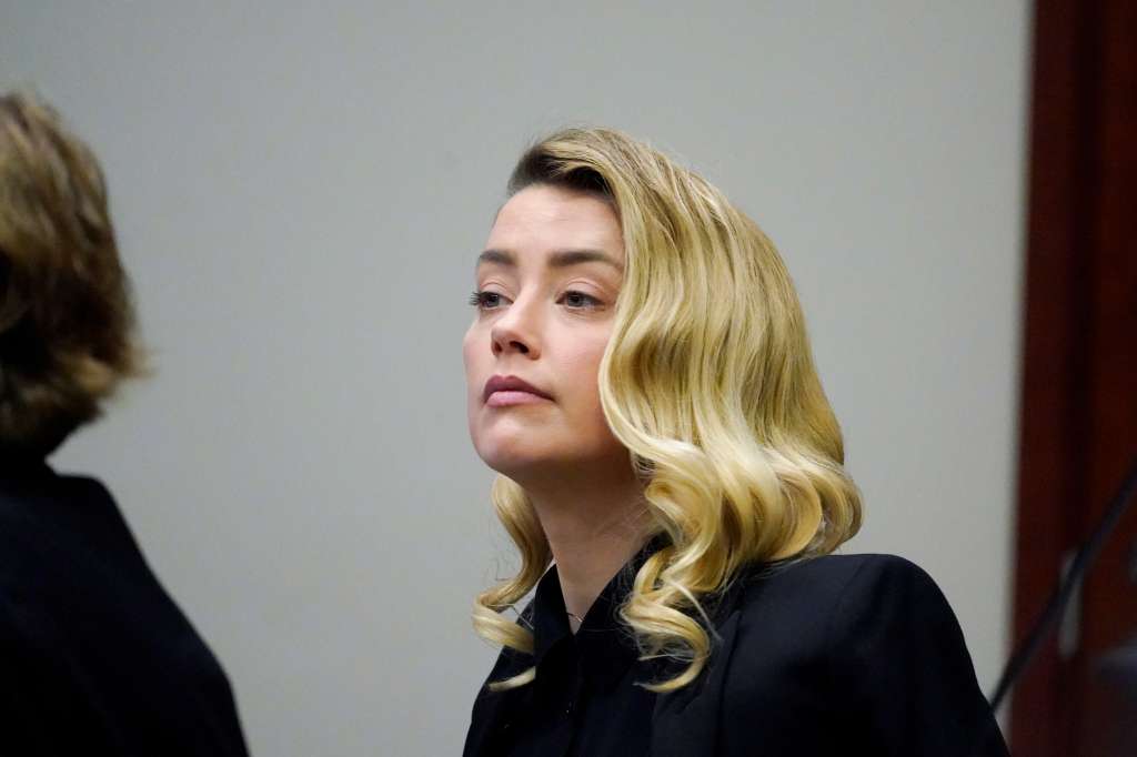 Fairfax (United States), 18/04/2022.- Actress Amber Heard listens in the courtroom at the Fairfax County Circuit Court in Fairfax, Virginia, USA, 18 April 2022. Johnny Depp's 50 million US dollars defamation lawsuit against Amber Heard that started on 10 April is expected to last five or six weeks. (Estados Unidos) EFE/EPA/Steve Helber / POOL