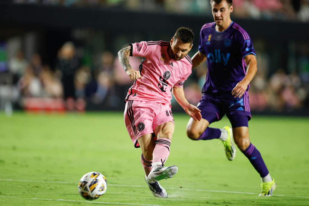 Inter Miami's Argentine forward #10 Lionel Messi kicks the ball away from Charlotte's US midfielder #34 Andrew Privett during the Major League Soccer (MLS) football match between Inter Miami and Charlotte FC at Chase Stadium in Fort Lauderdale, Florida, September 28, 2024.