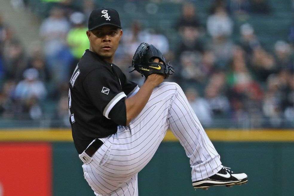 El lanzador colombiano José Quintana, de los Medias Blancas, tiene como promedio de carreras limpias 1.98, el séptimo mejor en las Grandes Ligas. / AFP