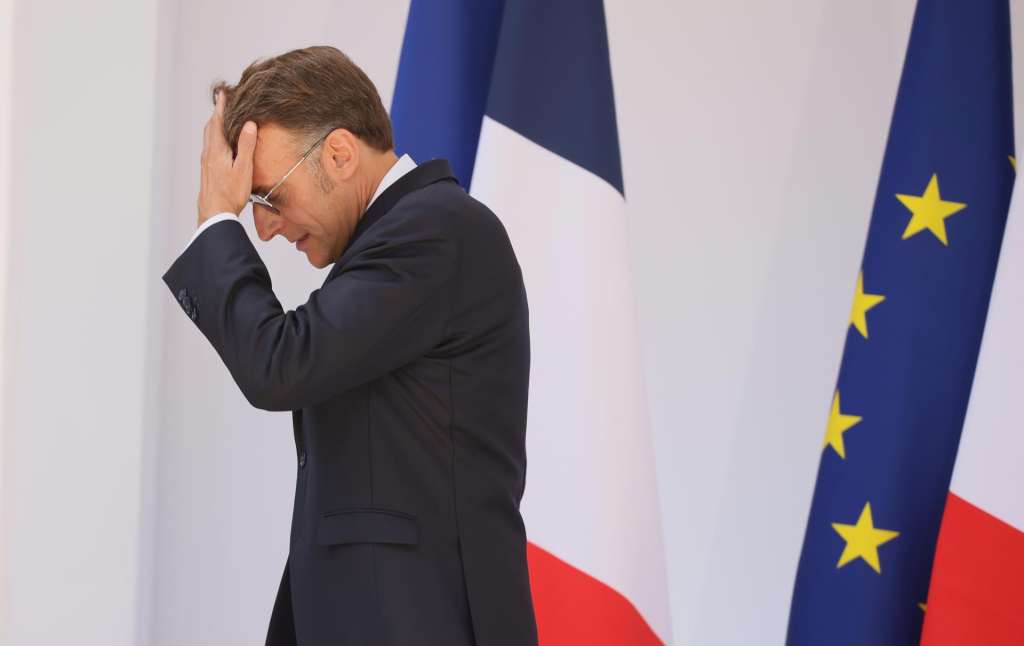 Paris (France), 13/07/2026.- French President Emmanuel Macron reacts after delivering his traditional address to the armed forces on the eve of the Bastille Day military parade at the Ministry of Defense in Paris, France, 13 July 2026. (Francia) EFE/EPA/THOMAS PADILLA / POOL MAXPPP OUT