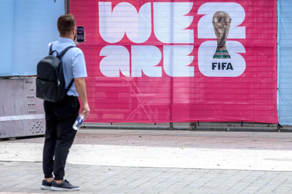 MIAMI (United States), 10/06/2026.- A person photograph the entrance of the FIFA Fan Festival Miami at Bayfront Park in Miami, Florida, USA, 10 June 2026. The FIFA Fan Festival Miami is the official FIFA World Cup 2026 fan zone at Bayfront Park in Downtown Miami. It is a free public event where fans can watch World Cup matches on giant screens, enjoy live music and cultural performances, explore interactive soccer experiences, and sample food and drinks from local and international vendors. It will be opening from 13 June to 5 July 2026. (Mundial de Fútbol) EFE/EPA/CRISTOBAL HERRERA-ULASHKEVICH