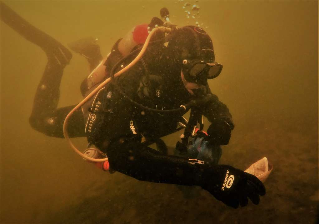 Buceo limpieza La Cocha