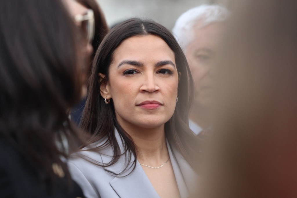 (FILES) US Representative Alexandria Ocasio-Cortez, Democrat from New York (R), looks on in support of the DEFIANCE Act on Capitol Hill in Washington, DC, on January 22, 2026.