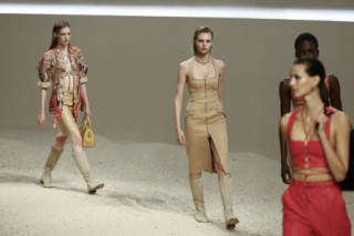 Models present creations by Hermes for the Women Ready-to-wear Spring-Summer 2026 collection as part of the Paris Fashion Week, in Paris on October 4, 2025. (Photo by Thibaud MORITZ / AFP)