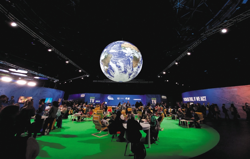 Zona de reunión y transmisión de la sede de la COP26 que se realizó en Glasgow, Reino Unido. / AFP
