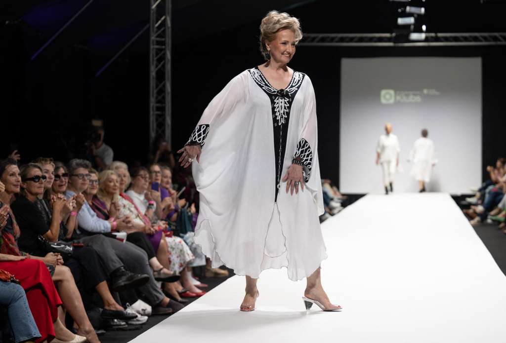 Members of a group of retired people present their own line of upcycled clothes the Vienna Fashion week at the Museum Quartier in Vienna, Austria on September 10, 2023.