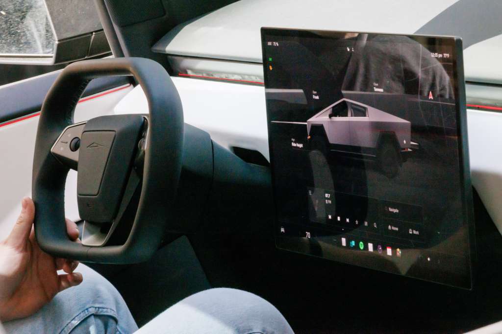 Berlin (Germany), 02/05/2024.- A person sits inside the Tesla Cybertruck, on display at the Mall of Berlin shopping mall, in Berlin, Germany, 02 May 2024. The Tesla Cybertruck will be on display in Berlin from 02 to 04 May 2024 and afterward in over 100 locations across 20 countries. (Alemania) EFE/EPA/CLEMENS BILAN
