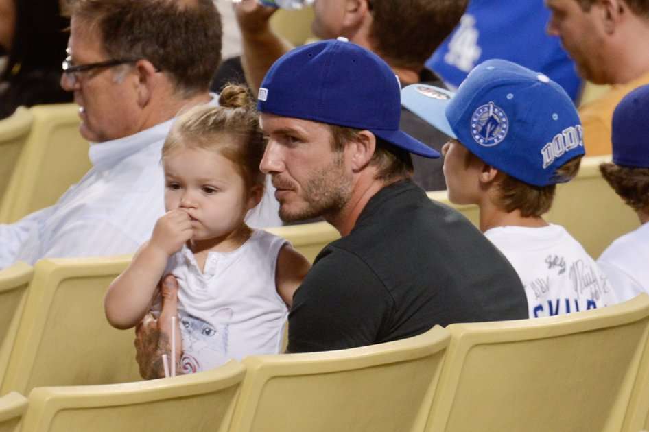 David Beckham junto a hija Harper.