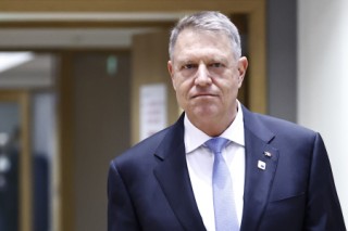 (FILES) Romania's President Klaus Iohannis arrives to attend a European Council summit at the EU headquarters in Brussels on March 21, 2024.