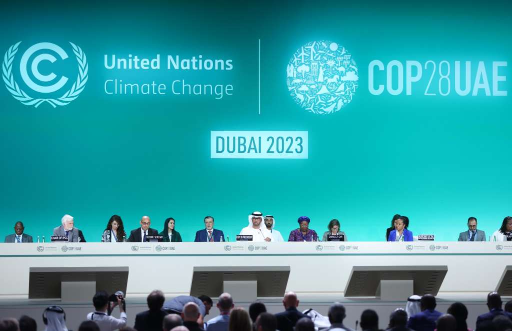 Dubai (United Arab Emirates), 30/11/2023.- Dr. Sultan Ahmed Al Jaber (C), President-Designate of COP28, the UAE's Minister for Industry and Advanced Technology, UAE Climate Change Special Envoy and Managing Director and Group CEO of the Abu Dhabi National Oil Company (ADNOC) speaks, during the opening ceremony of COP28 Conference in Dubai, United Arab Emirates, 30 November 2023. The 2023 United Nations Climate Change Conference runs from 30 November to 12 December, and is expected to host one of the largest number of participants in the annual global climate conference as over 70,000 estimated attendees, including the member states of the UN Framework Convention on Climate Change (UNFCCC), business leaders, young people, climate scientists, Indigenous Peoples and other relevant stakeholders will attend. (Emiratos Árabes Unidos) EFE/EPA/ALI HAIDER
