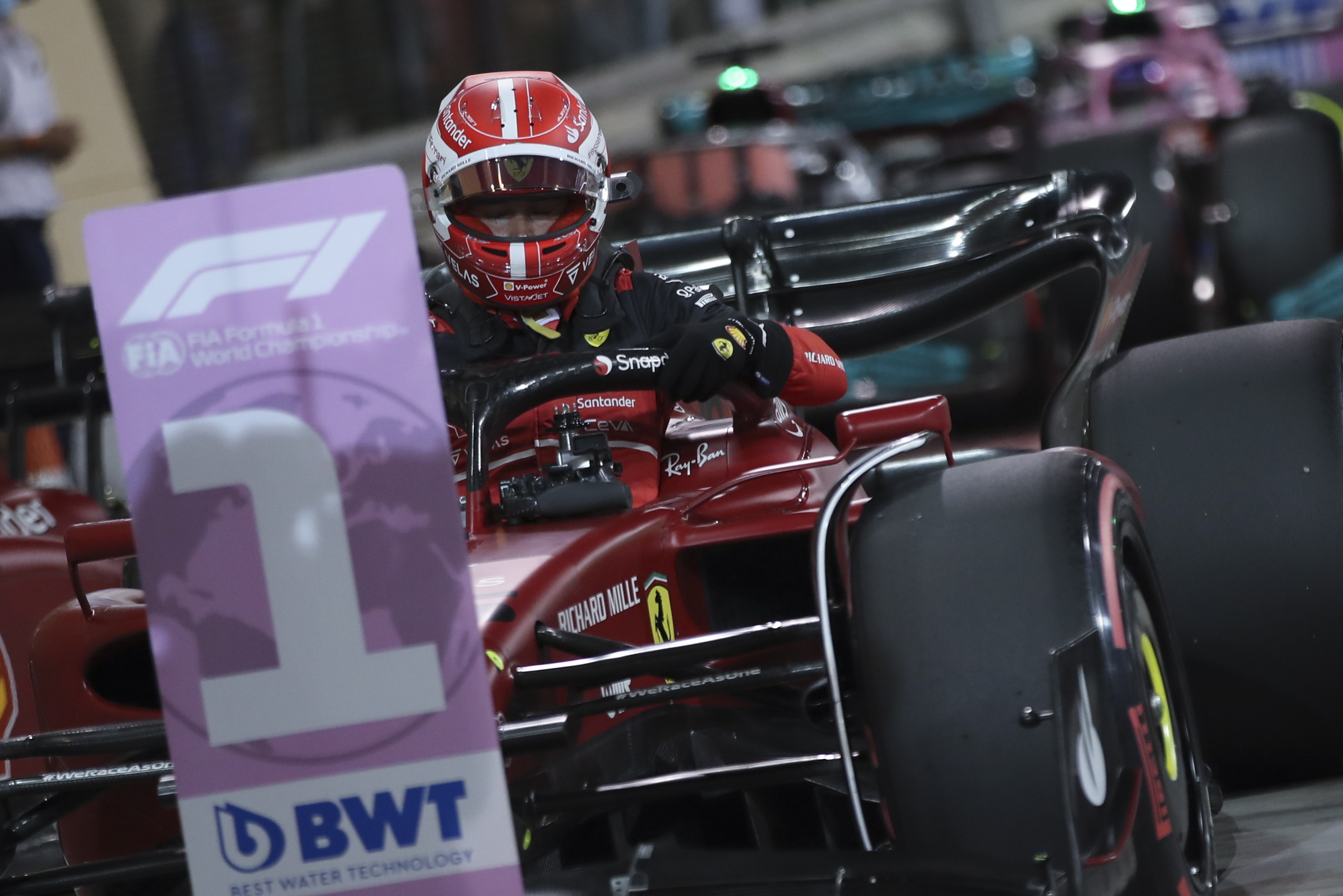 Sakhir (Bahrain), 19/03/2022.- Monaco's Formula One driver Charles Leclerc of Scuderia Ferrari Mission Winnow climbs out of his car after taking pole position during qualifying for the Formula One Grand Prix of Bahrain at the Bahrain International Circuit in Sakhir, Bahrain, 19 March 2022. (Fórmula Uno, Bahrein) EFE/EPA/ALI HAIDER