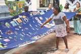 Hilo, aguja y tecnología para tejer la reconciliación
