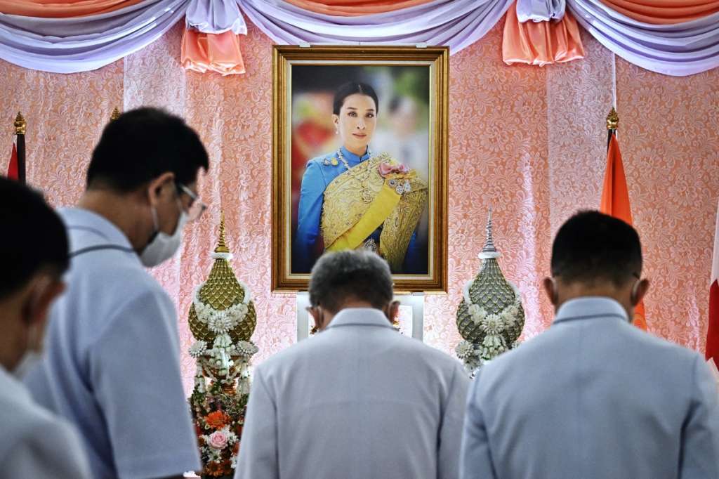 (FILES) Well-wishers bow in front of an image of Thailand's Princess Bajrakitiyabha Mahidol at Chulalongkorn Hospital in Bangkok on December 16, 2022.
