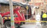 Tragedia en Usme: mueren dos personas tras choque de camión contra una casa