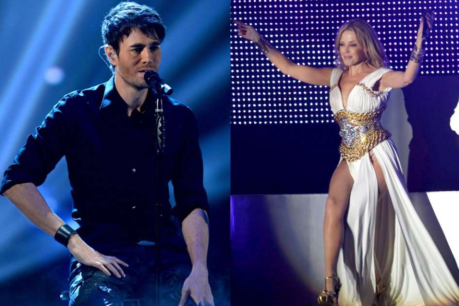 Los cantantes Enrique Iglesias y Kylie Minogue.