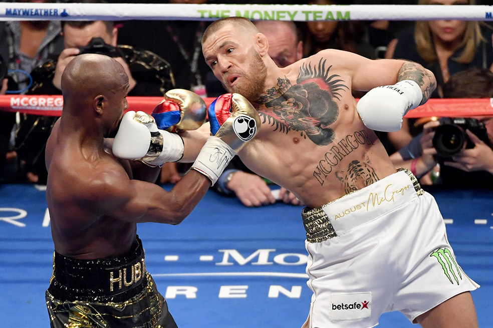 Floyd Mayweather Jr. y Conor McGregor. / AFP