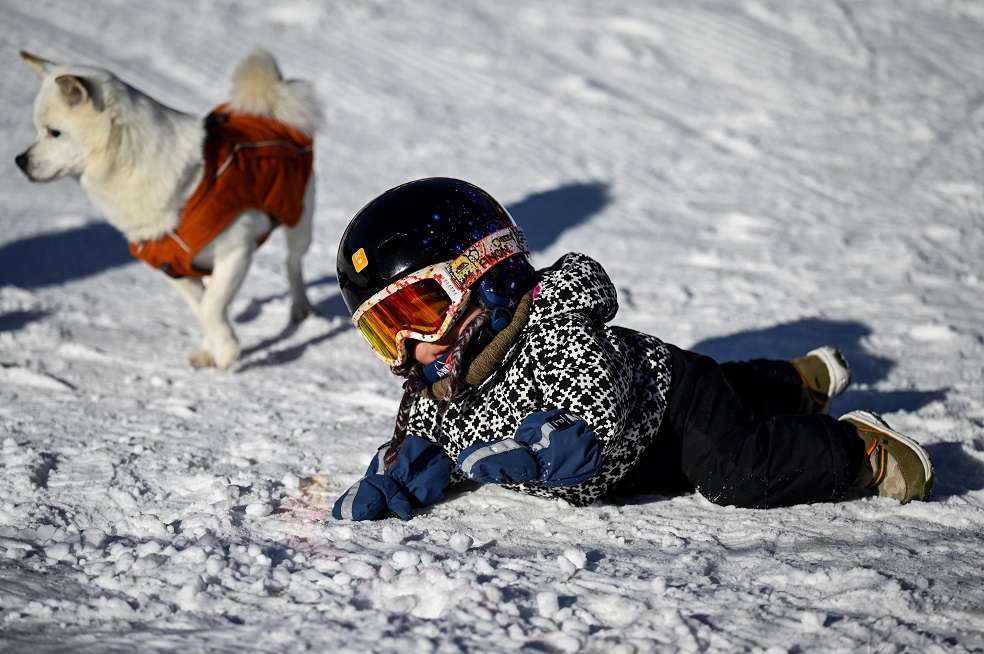 Bebé snowboarding