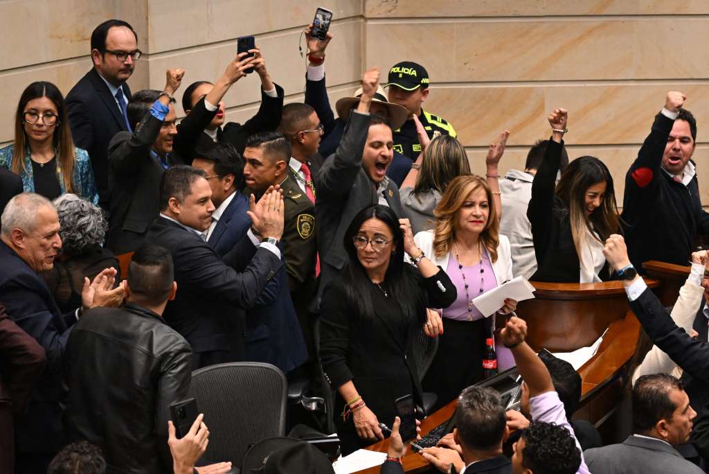 Opposition senators react after the Senate voted against the government labor reform referendum promoted by Colombia's President Gustavo Petro in Bogota on May 14, 2025. (Photo by Raul ARBOLEDA / AFP)