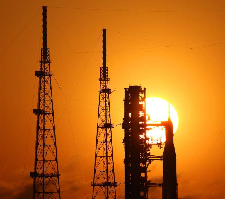 NASA's Artemis II Space Launch System (SLS) rocket and Orion spacecraft are seen at sunrise at Launch Pad 39B at the Kennedy Space Center in Cape Canaveral, Florida on March 24, 2026.