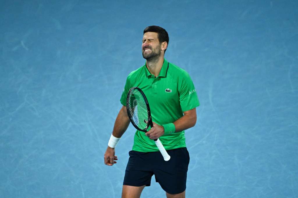 MELBOURNE (Australia), 01/02/2026.- Novak Djokovic of Serbia grimaces during the Men’s Singles final match against Carlos Alcaraz of Spain at the Australian Open tennis tournament in Melbourne, Australia, 01 February 2026. (Tenis, España) EFE/EPA/JAMES ROSS AUSTRALIA AND NEW ZEALAND OUT