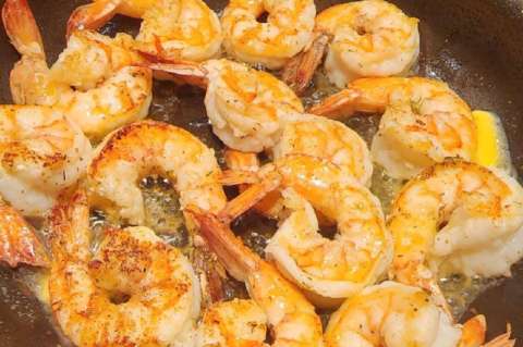 Receta para preparar langostinos con aguardiente y cilantro