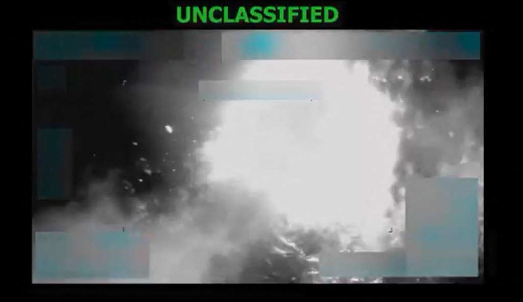 This screen grab from a video posted by US Defense Secretary Pete Hegseth on his X account on October 22, 2025, shows what Hegseth says is US military forces conducting a strike on a vessel being operated by a "designated terrorist organization conducting narco-trafficking" in the Eastern Pacific Ocean on October 21, 2025.