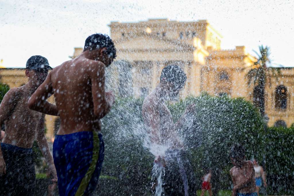 Children play in a fountain in Sao Paulo, Brazil on December 26, 2025.