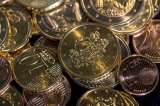 Euro cae a su nivel más bajo en 12 años frente al dólar