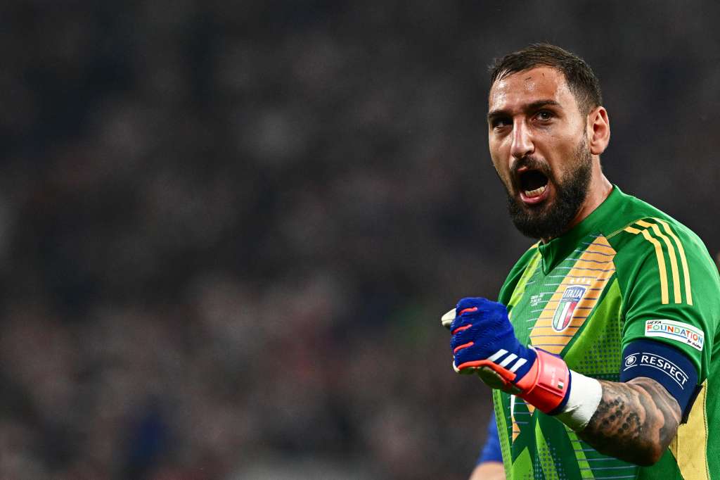 (FILES) Italy's goalkeeper #01 Gianluigi Donnarumma celebrates at the end of the UEFA Euro 2024 Group B football match between Croatia and Italy at the Leipzig Stadium in Leipzig on June 24, 2024.