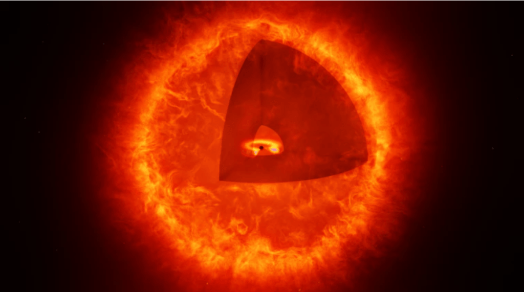 Representación artística de una estrella con agujero negro, la explicación que muchos astrónomos prefieren para los pequeños puntos rojos.