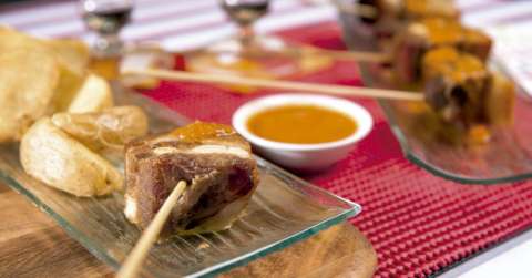 Costillas de cerdo ahumadas con salsa BBQ de panela y ron