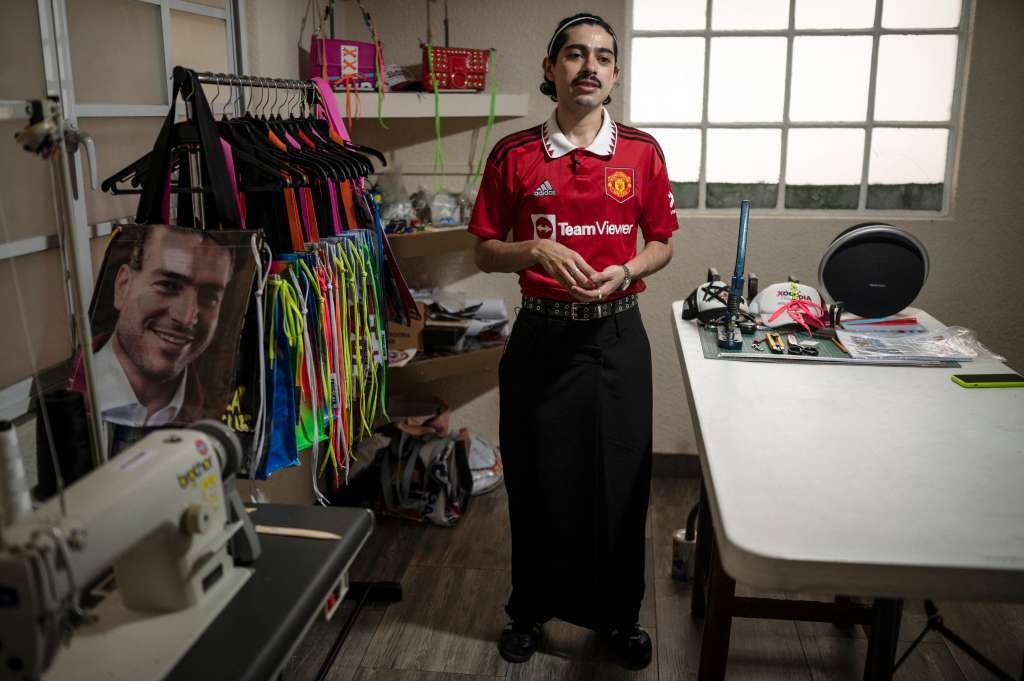 Mexican fashion designer Mizael Perea, 33, speaks during an interview with AFP in his workshop in Mexico City on June 27, 2024.