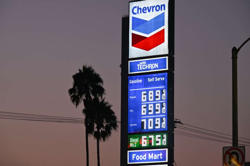 (FILES) Gas prices are seen at a Chevron gas station in Los Angeles on September 28, 2023.