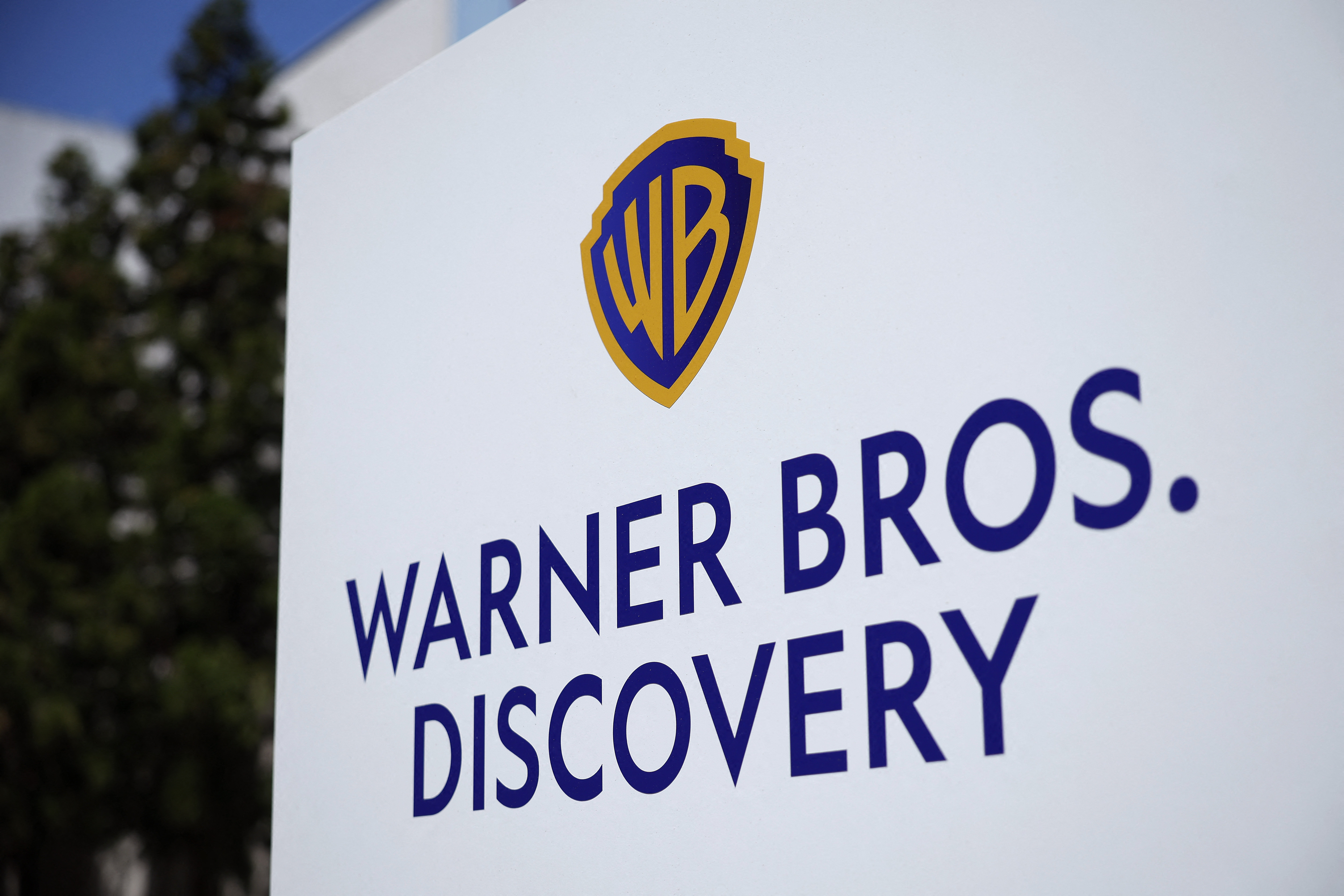 A sign for Warner Brothers Discovery is seen outside of the Turner Entertainment Networks building home to CNN and the location of the first presidential debate, on June 25, 2024 in Atlanta, Georgia.