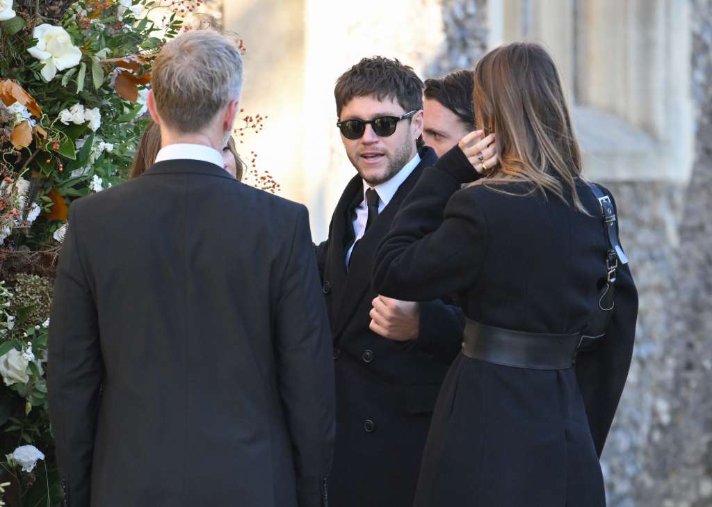AMERSHAM, ENGLAND - NOVEMBER 20: Niall Horan attends the funeral for singer Liam Payne, former member of One Direction, on November 20, 2024 in Amersham, England. Former One Direction star Liam Payne's private funeral in Amersham has been widely anticipated to draw celebrities and fans alike, wishing to pay their final respects. The singer died after falling from a hotel balcony in Buenos Aires on October 16. (Photo by Karwai Tang/WireImage)