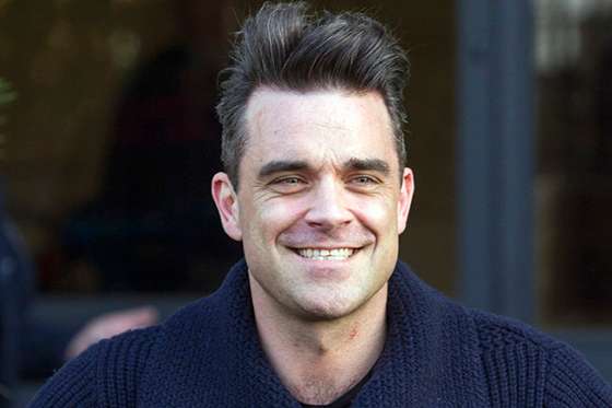 Singer Robbie Williams is pictured arriving at the ITV studios for a guest appearance on the 'Alan Carr: Chatty Man' show.
<P>
Pictured: Robbie Williams
<P><B>Ref: SPL503198 270213 </B><BR/>
Picture by: Simon Earl / Splash News<BR/>
</P><P>
<B>Splash News and Pictures</B><BR/>
Los Angeles: 310-821-2666<BR/>
New York: 212-619-2666<BR/>
London: 870-934-2666<BR/>
photodesk@splashnews.com<BR/>
</P>