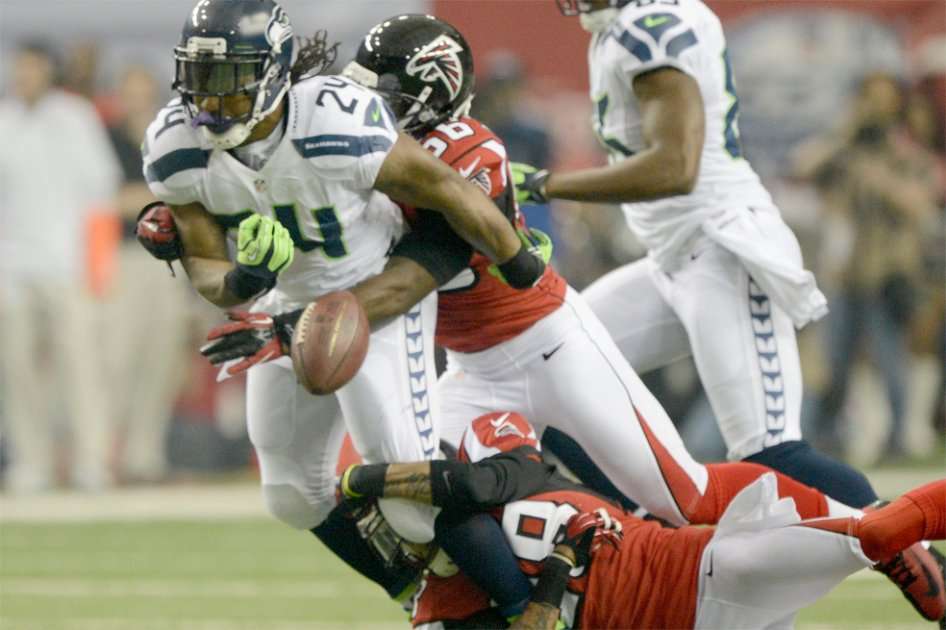 Exitoso derribe de la defensa de Atlanta para evitar el avance de Seattle / AFP