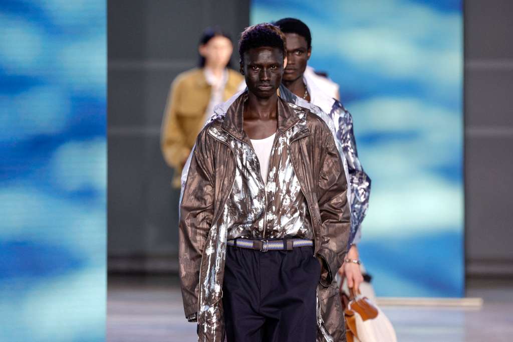 A model presents a creation from the Hermes Spring/Summer 2025 menswear ready to wear collection as part of Paris Fashion Week in Paris, on June 22, 2024. (Photo by Geoffroy VAN DER HASSELT / AFP)