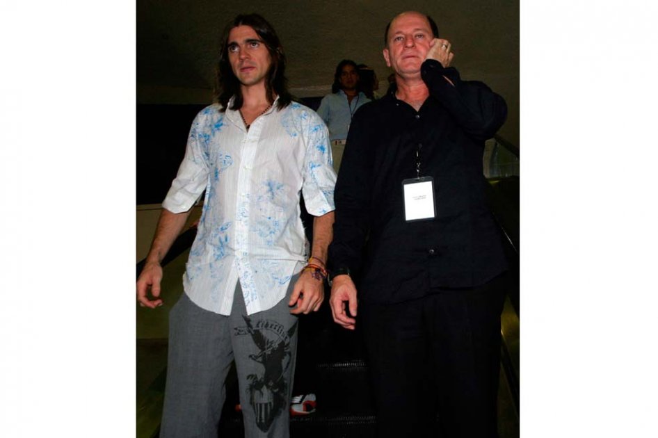 Juanes y Fernán Martínez en 2009. / Efe