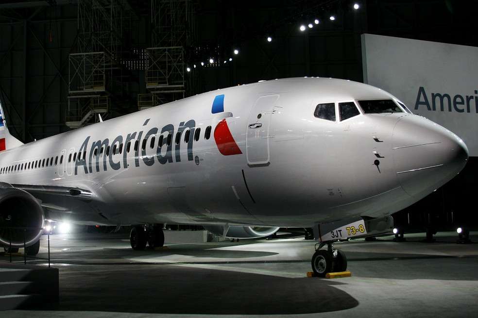 An American Airlines jet shows the new logo and rebranding of American Airlines planes at DFW Airport in Fort Worth, Texas, on Thursday Jan. 17, 2013. Bloomberg News/Mike Fuentes