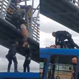 Conmoción en vía pública: hombre se intentó lanzar de un puente peatonal