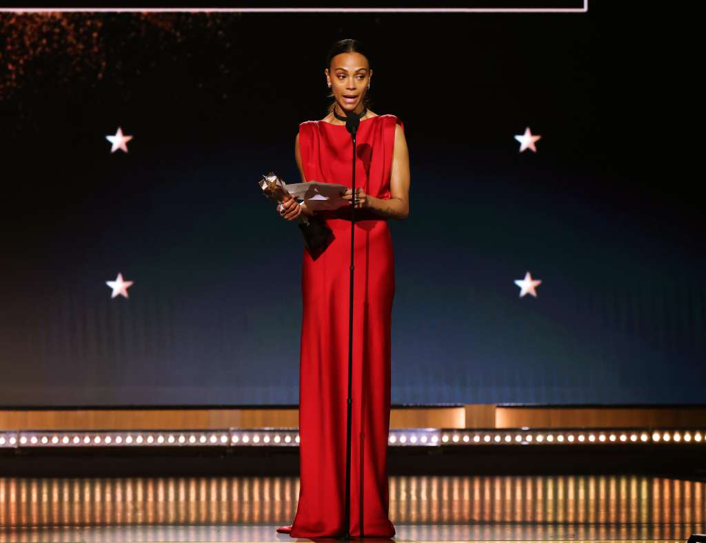 SANTA MONICA, CALIFORNIA - FEBRUARY 07: Zoe Saldaña accepts the Best Supporting Actress award for "Emilia Pérez" onstage during the 30th Annual Critics Choice Awards at Barker Hangar on February 07, 2025 in Santa Monica, California. (Photo by Kevin Winter/Getty Images for Critics Choice Association)