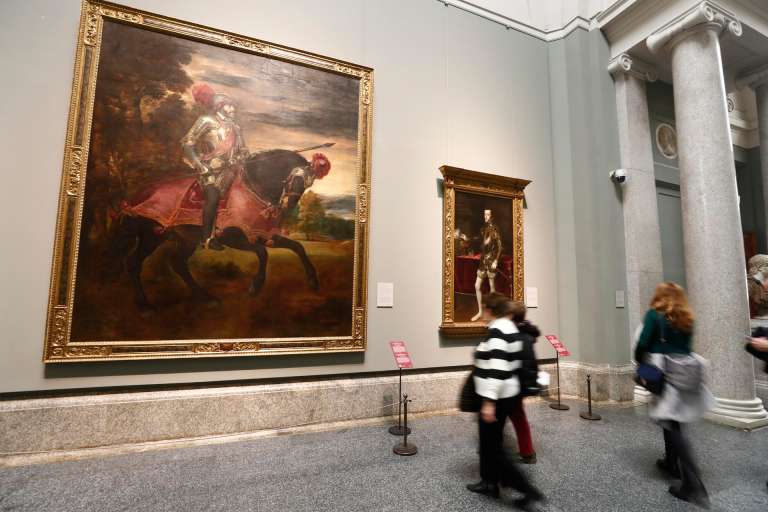 Retratos de Carlos V (i) y Felipe II, de Tiziano.