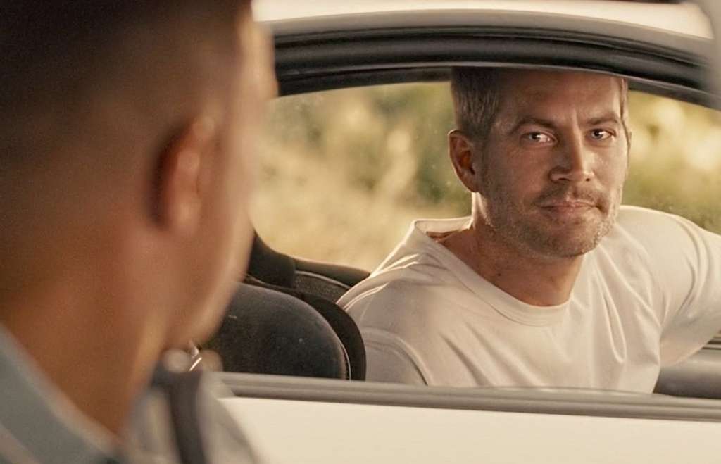 El actor Paul Walker, quien murió en 2013, en su interpretación de Brian O’ Conner en la saga "Rápido y Furioso".