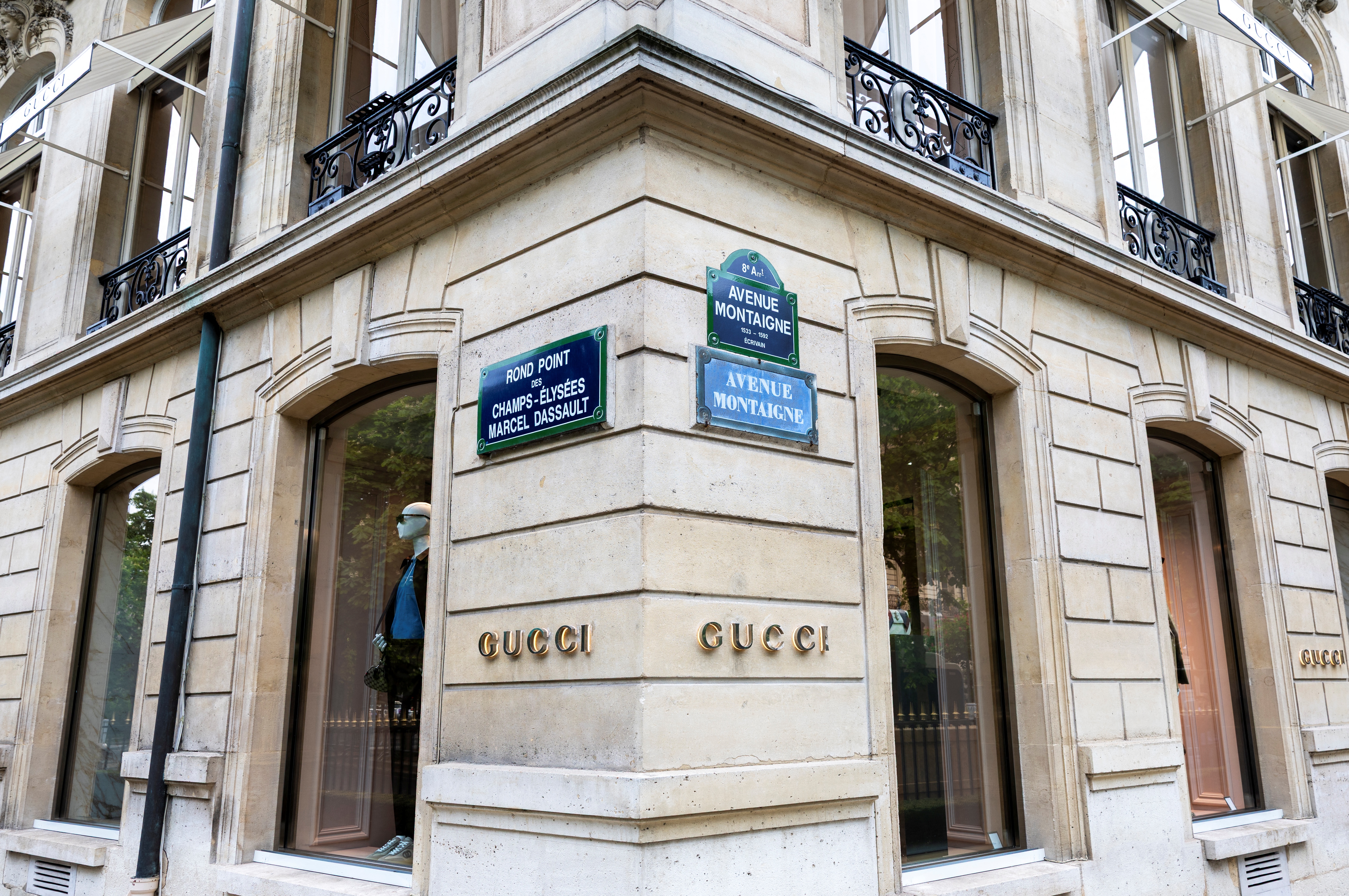 (FILES) This photograph shows a logo on the facade of a shop of Italian luxury fashion brand Gucci on Rue Montaigne in Paris on April 16, 2025.