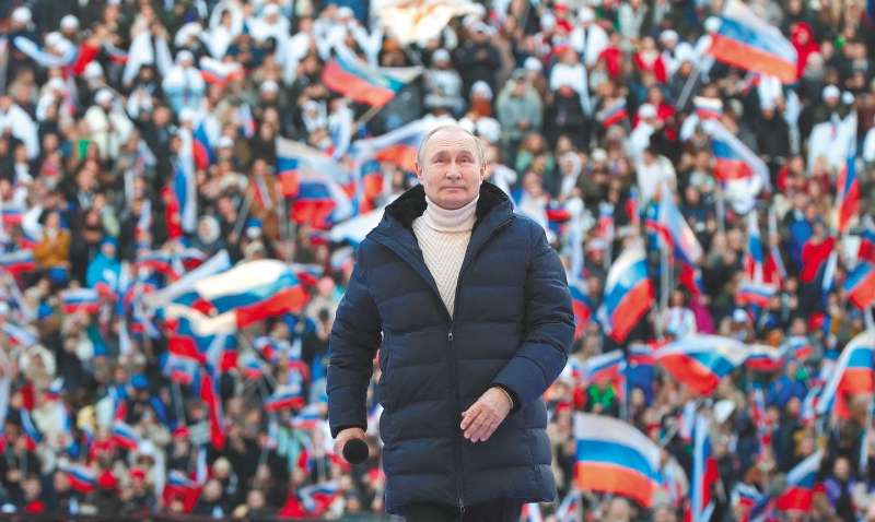 Vladimir Putin, el pasado 18 de marzo, en un estadio durante la celebración de los ocho años de la anexión de Crimea. / AFP